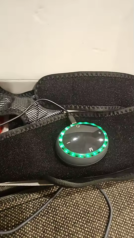 Verified customer photo of ThermaFlex Pro heated massager being used at home