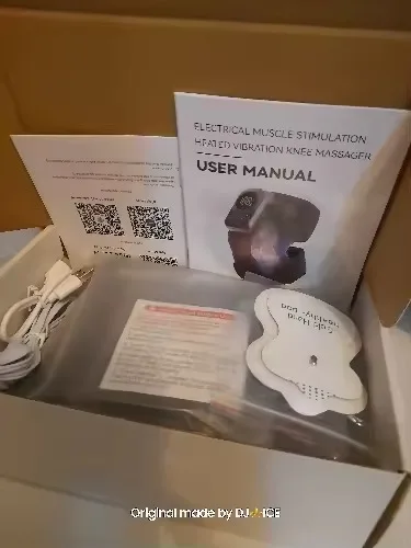 ThermaFlex Pro unboxing showing user manual USB-C cable and EMS pads